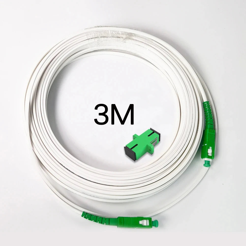 A coil of white single-mode fiber optic cable with green connectors.