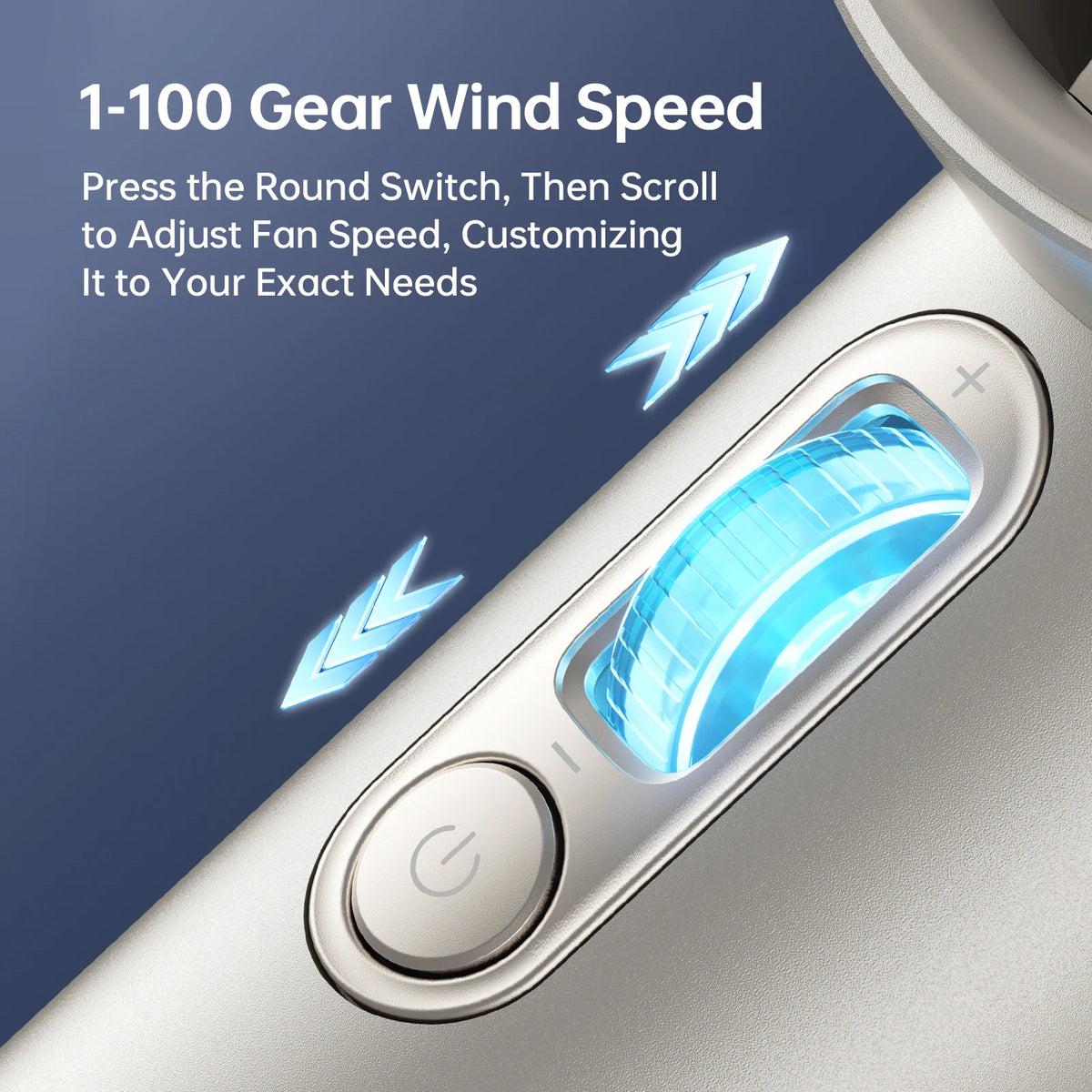 Close-up of a silver handheld fan showing the round switch for adjusting wind speed.
