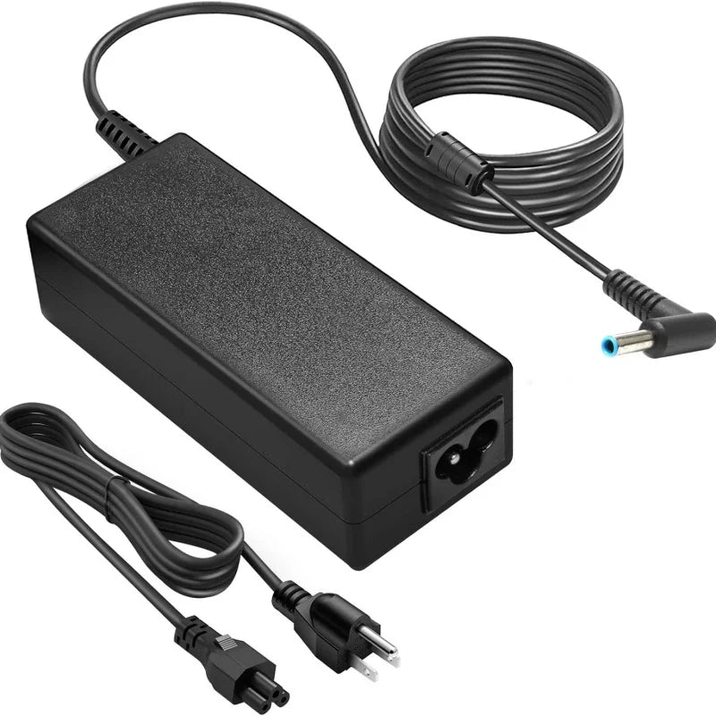 Black 65W AC adapter for HP laptops with coiled power cord and plug.