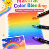 Colorful paint pens creating soft gradients and rainbows on paper