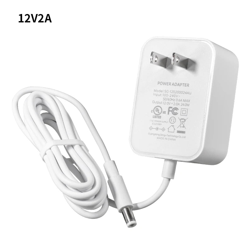 A white 12V2A universal DC switching power adapter with a cord and plug.