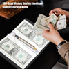 A hand is placing US dollar bills into a savings envelope within a budget storage book.