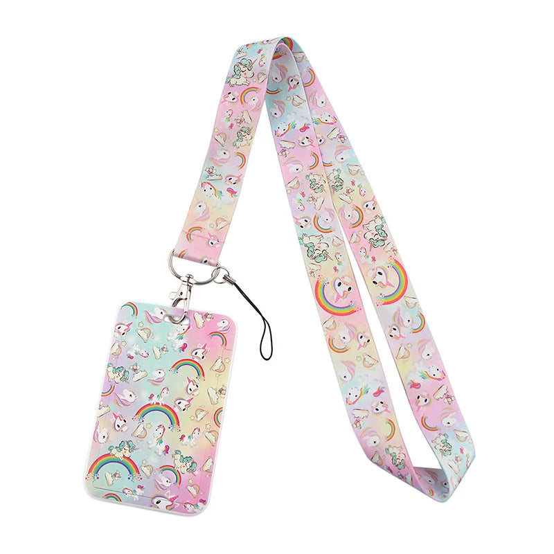 A pink and purple patterned fabric lanyard with a clear plastic tag attached.