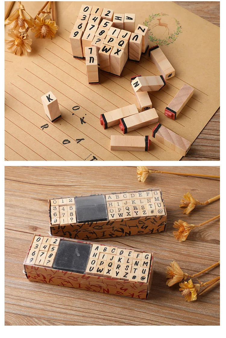 A set of vintage wooden stamp seals and alphabet blocks for card making arranged on a brown paper background.