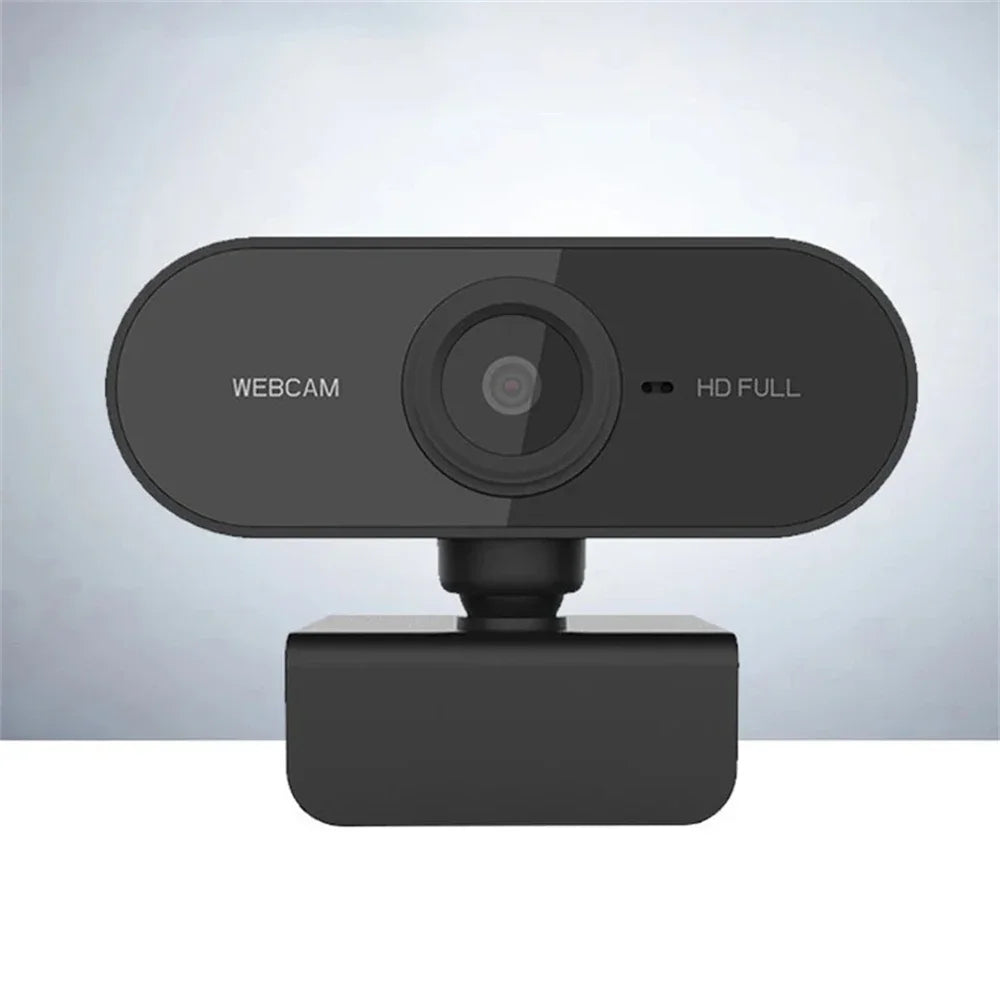 A black HD webcam device with a lens and indicator light is shown on a white surface.