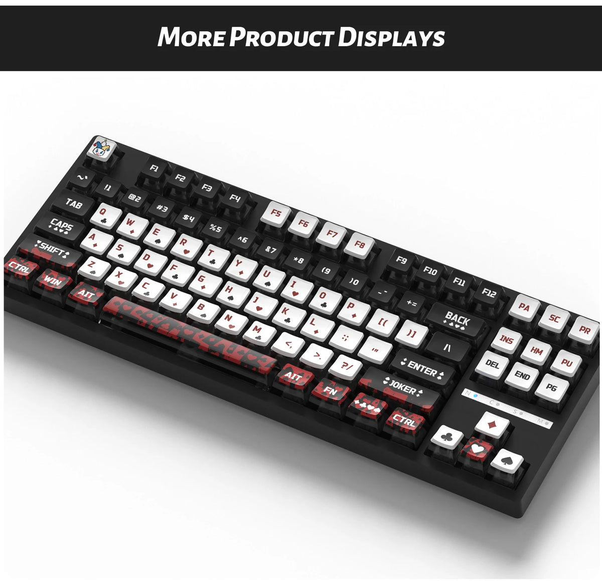 A close-up view of a black mechanical keyboard with red and white keycaps, showing various function keys and navigation contr