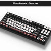 A black mechanical keyboard with red and white keycaps is shown from above.