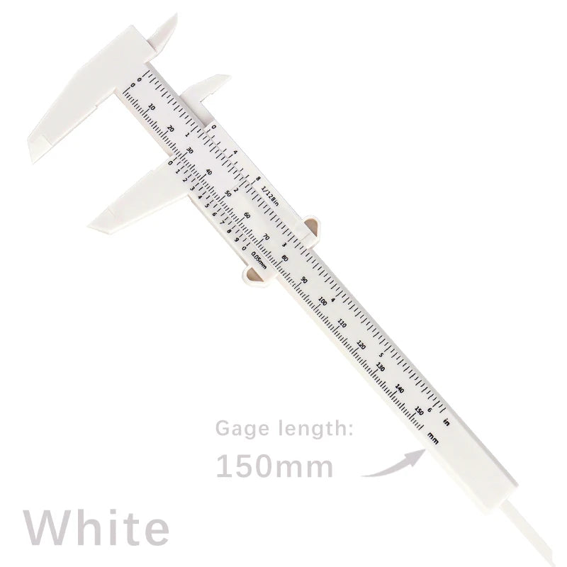 White precision eyebrow measuring caliper with a scale marked in millimeters and inches.