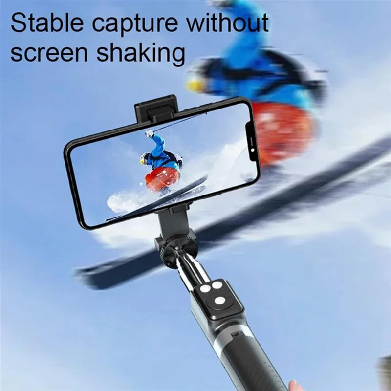 A selfie stick tripod is used to stabilize a phone camera while capturing a subject in mid-air against a blue sky.