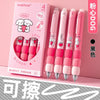 A set of four pink and white gel pens with soft grips are displayed in a box, featuring various cute designs.