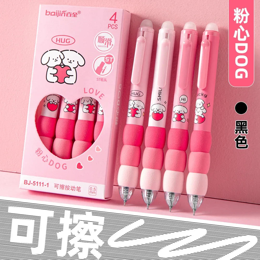A set of four pink and white gel pens with soft grips are displayed in a box, featuring various cute designs.