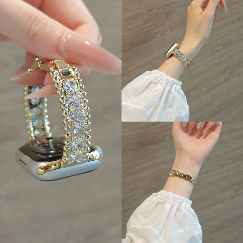 A close-up of a crystal-embellished watch strap with sparkling zircon accents being worn on a wrist.