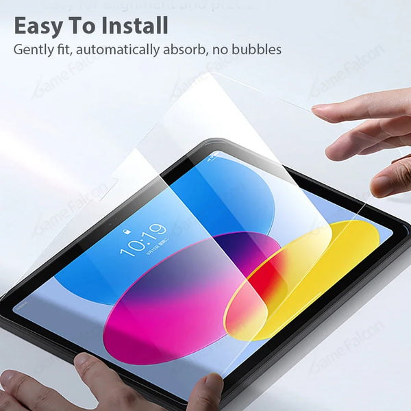A hand is gently installing a dual tempered glass screen protector onto an iPad screen.