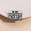 A rectangular enamel pin with black text that reads In My Defense I Was Left Unsupervised