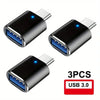 Three black USB-C to USB-A adapters for data transfer