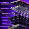A close-up view of a wired compact gaming keyboard assembly showing various components like keycaps, plates, and PCB.