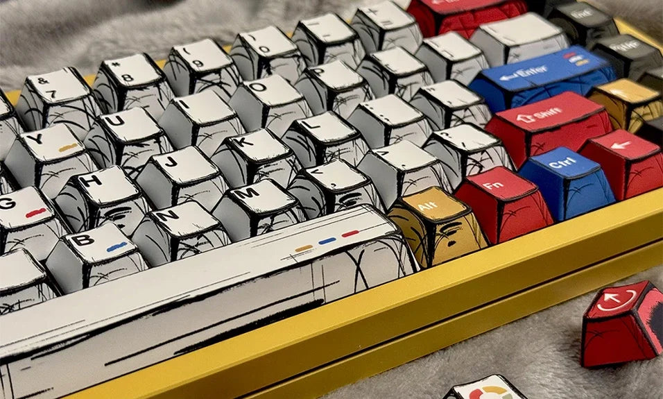 A close-up view of custom cherry profile mechanical keyboard keycaps arranged in a yellow tray.