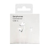 White earphones with USB C connectors shown in a product packaging box.