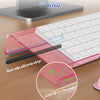 A high quality keyboard stand featuring a pink acrylic wrist rest and a non-slip silicone strip for ergonomic use.