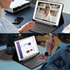 A woman is using a Bluetooth keyboard case for an iPad on a laptop, demonstrating its use.