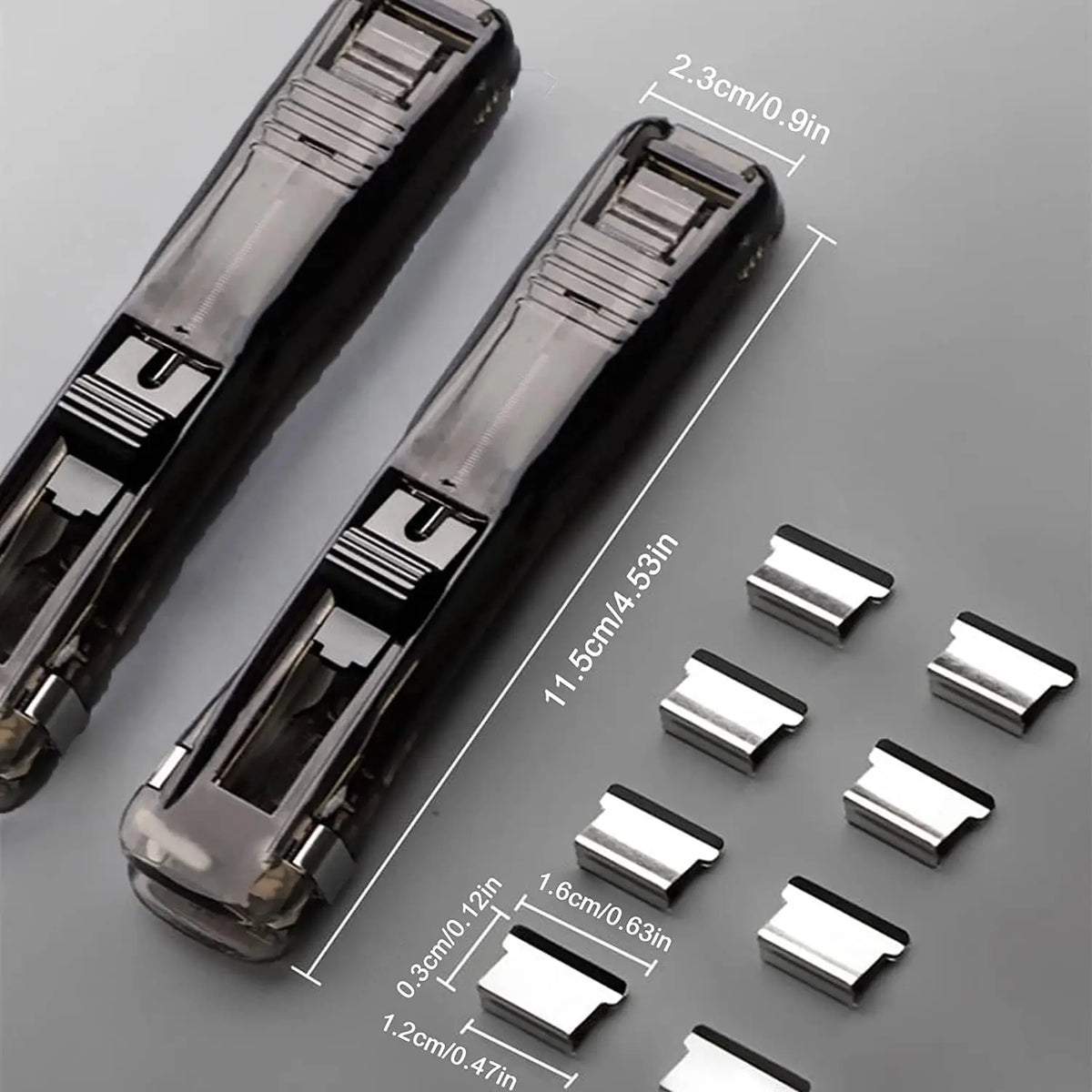 A black handheld binder clip pusher with stainless steel refill clips shown in various sizes.
