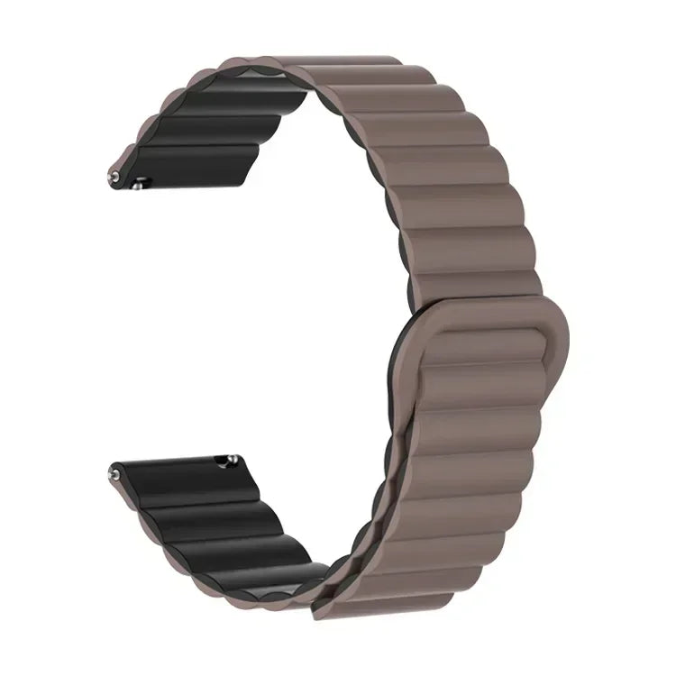 A close-up view of a brown adjustable magnetic loop watch band.