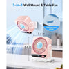 A pink 2-in-1 wall mount and table fan with a mesh grille, shown in both mounted and standalone forms.