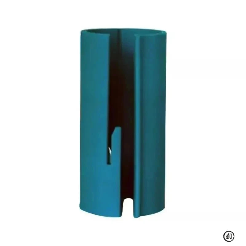 A teal portable mini paper cutting machine with a vertical slot design.