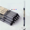 A collection of black fine point pens is displayed on a white background.
