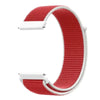 A close-up view of a red and white nylon loop watch strap for a child's watch.