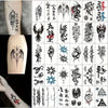 Una cuadrícula de pegatinas de tatuajes temporales de múltiples diseños con diversos motivos asiáticos tradicionales y estili