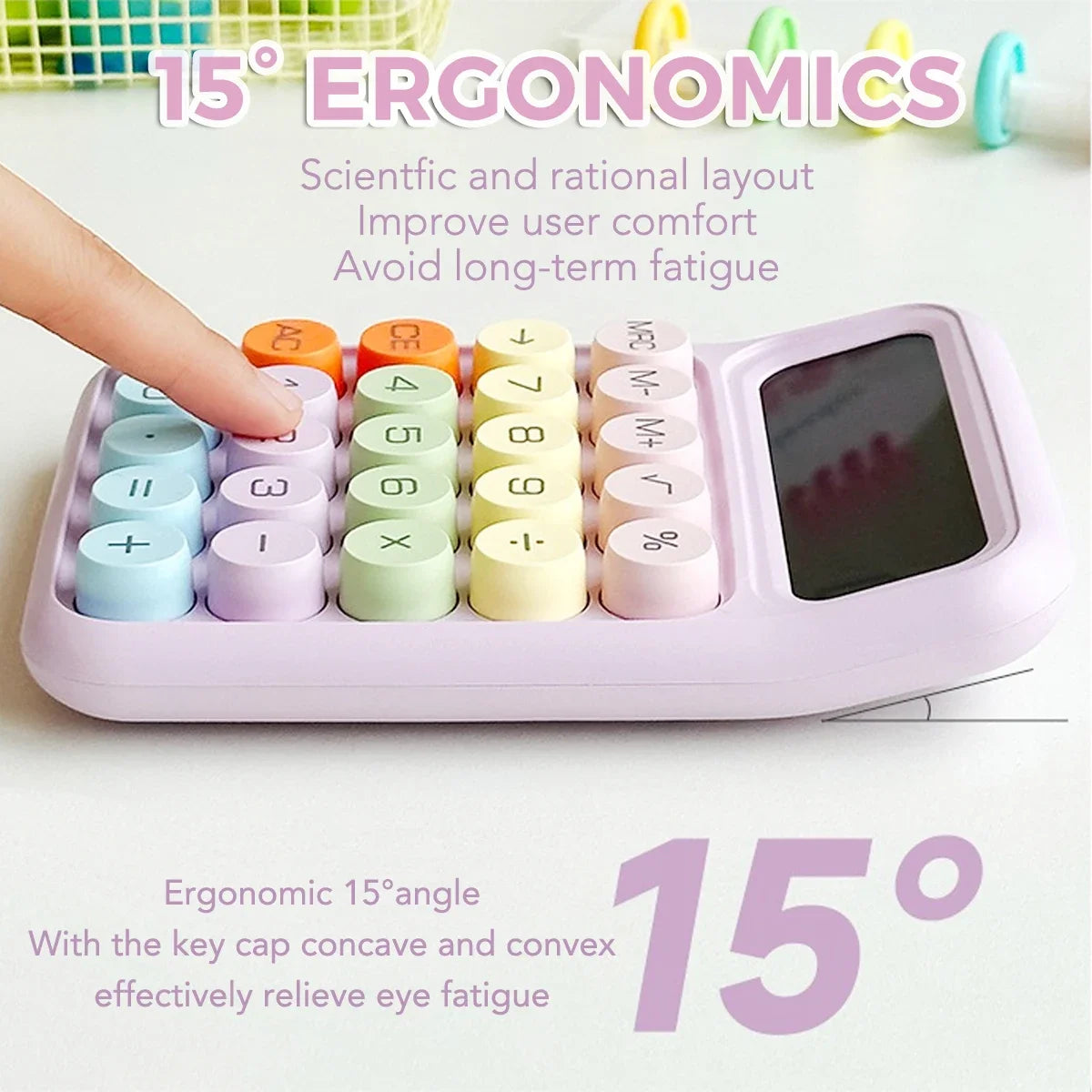 A pink 15-degree ergonomic calculator with colored keys is shown next to a finger demonstrating the design.