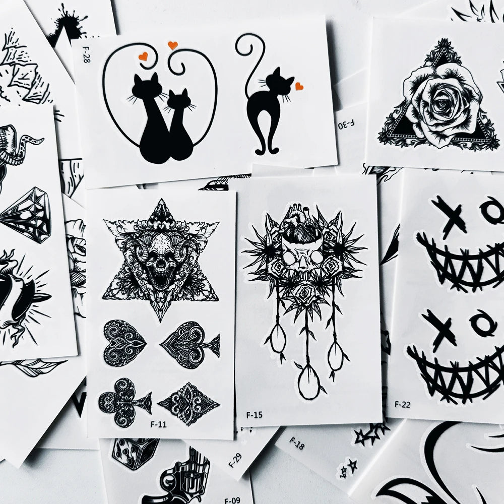 Colección de pegatinas temporales blanco y negro con diseños de gatos, rosas, calaveras y abstracto
