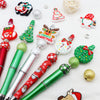A set of decorative beaded ballpoint pens featuring Christmas and winter themes in red, green, and silver.