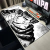 A large black and white drawing of a fierce character is displayed on a gaming mouse pad next to a keyboard and mouse.