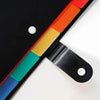 A colorful document organizer bag with multiple colored compartments shown diagonally on a white surface.