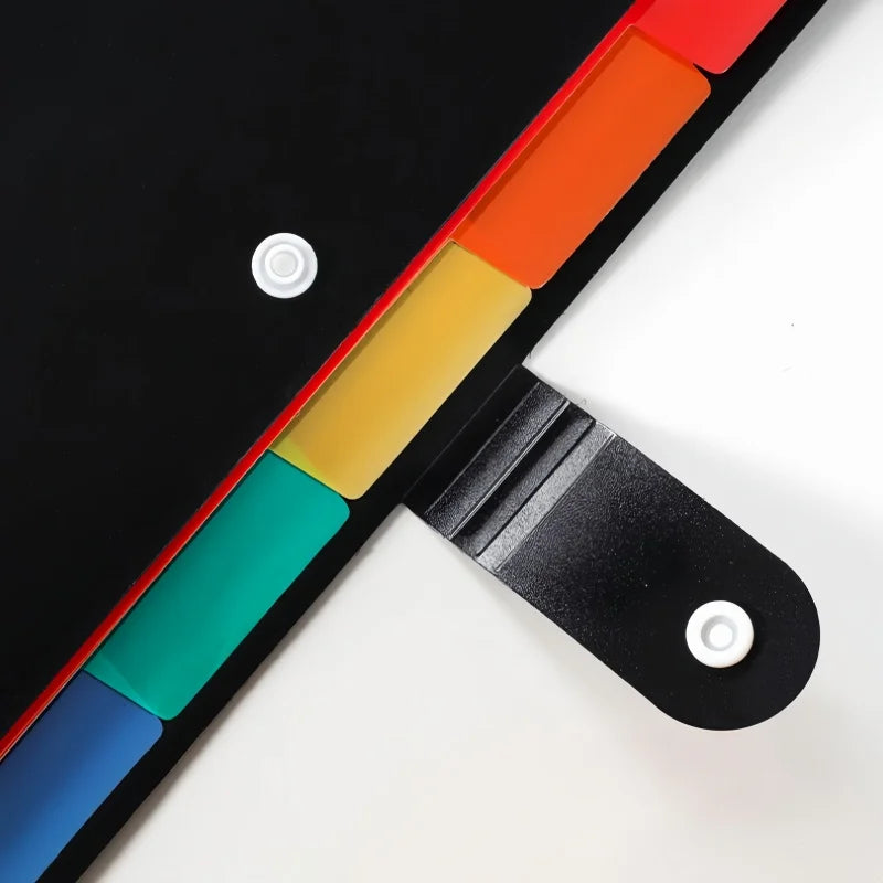 A colorful document organizer bag with multiple colored compartments shown diagonally on a white surface.