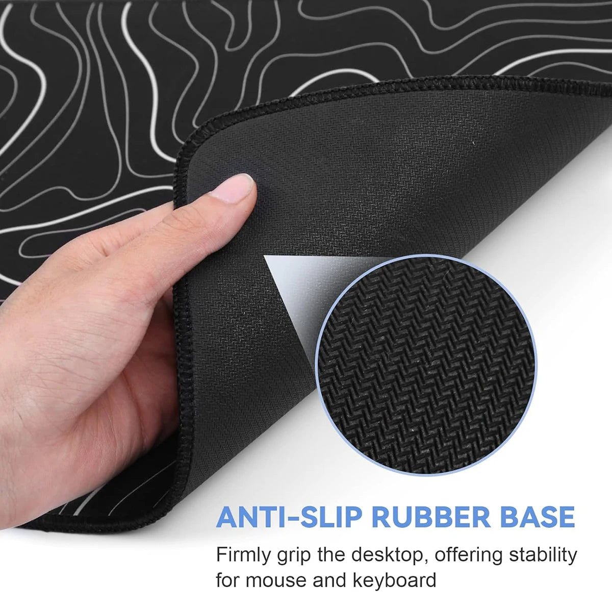 Hand grips a black anti-slip rubber base for a mouse and keyboard pad