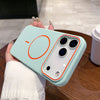 A light mint green phone case with a clear back showing three camera lenses is held in a person's hand.
