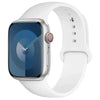 A white silicone sport band is shown with an Apple Watch attached.