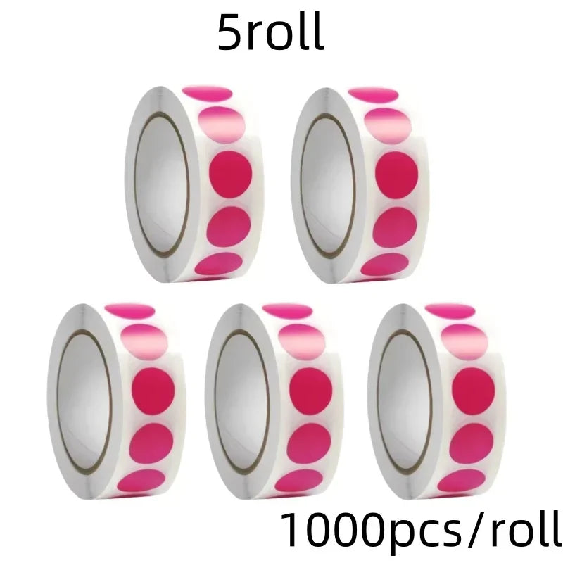 Roll of 5roll round dot labels with pink and white colors for organization