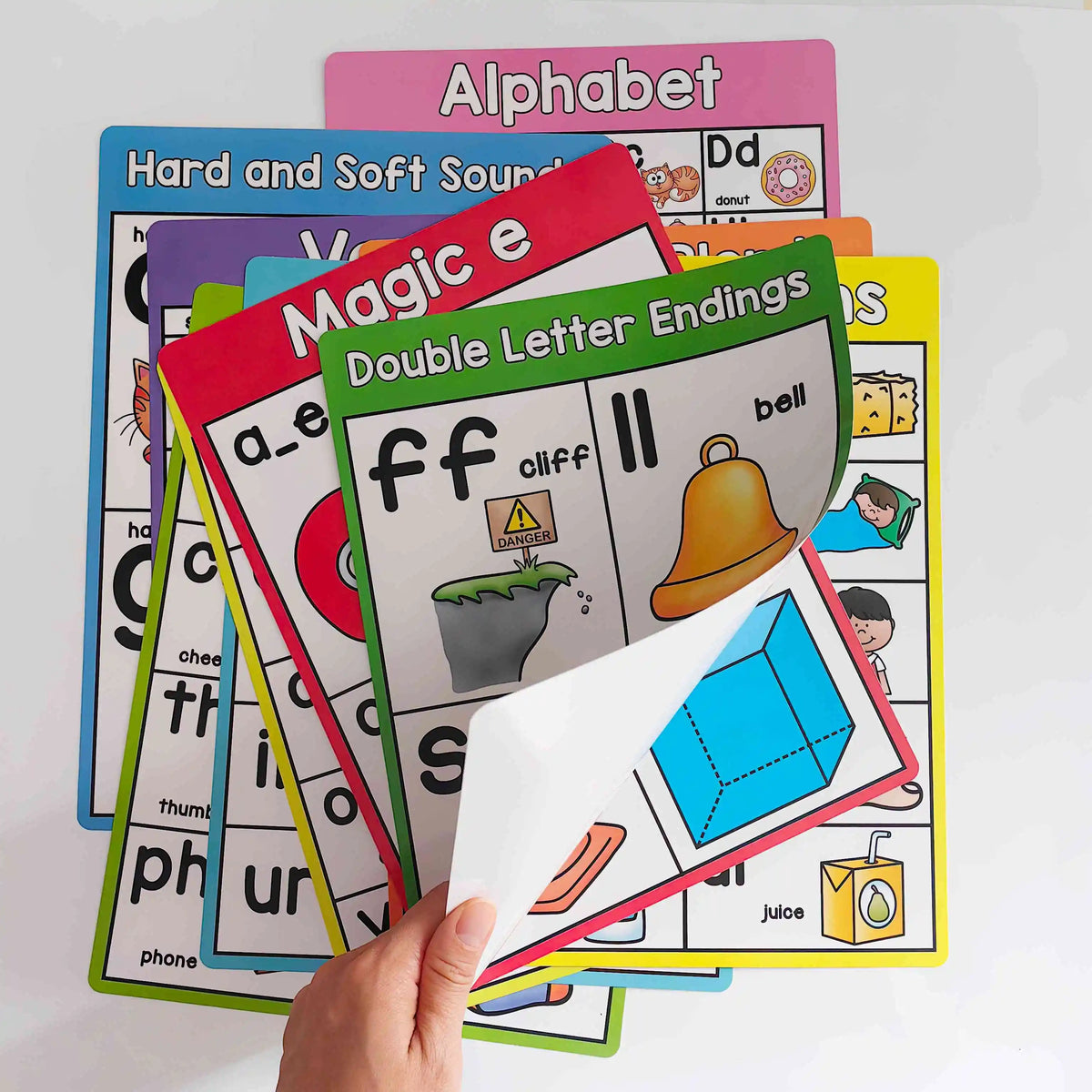A colorful set of phonics teaching aids including alphabet cards and magic letter endings for early childhood education