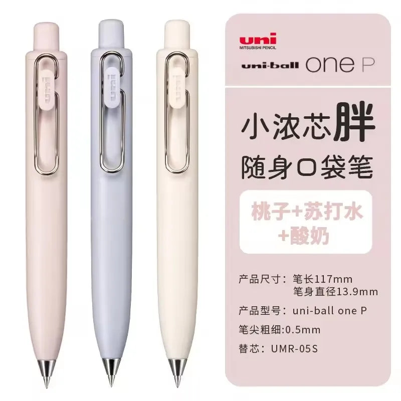 A set of light pink Uni-Ball One P gel pens shown in various angles and with the tip exposed.