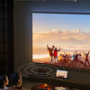 Fernseher mit Landschaftsszene bei Sonnenuntergang, verbunden durch USB-C auf HDMI 2.1.