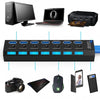 Schwarzer 7-Port-USB 2.0-Hub mit Laptop, Kamera und Zubehör