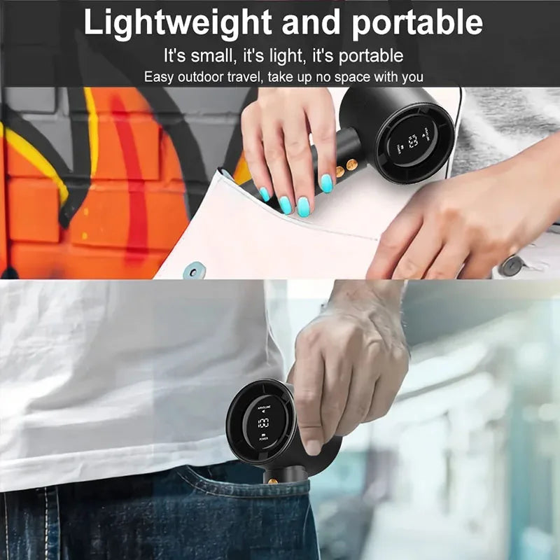 A hand is holding a black handheld cooling fan, demonstrating its lightweight and portable design.