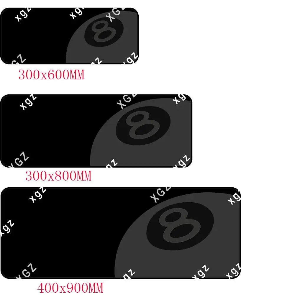 Three black billiard balls of different sizes shown on a dark mouse pad