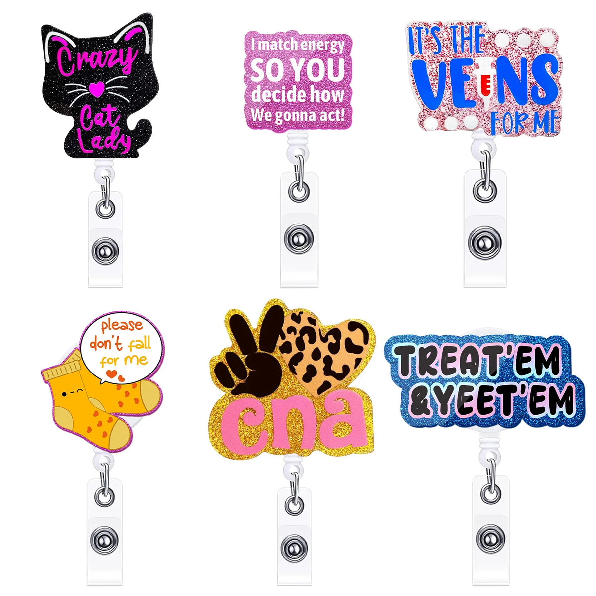 A set of five colorful acrylic nurse ID badge holders featuring various text and designs
