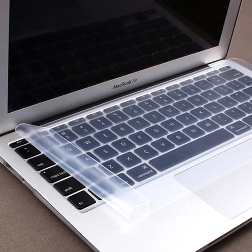 Clear silicone keyboard cover protecting a MacBook Air laptop keyboard.