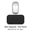 Black one-hand mouse pad with a mouse resting on top
